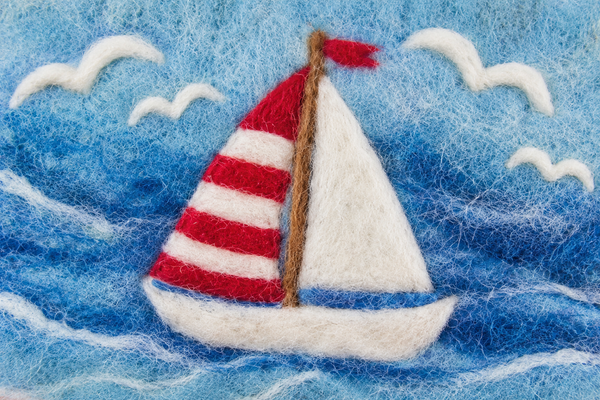 Filz Täschchen mit Segelboot | Reißverschluss Täschchen aus Wolle | maritime Tasche | handgefilzt | Geschenk Meer & Küste