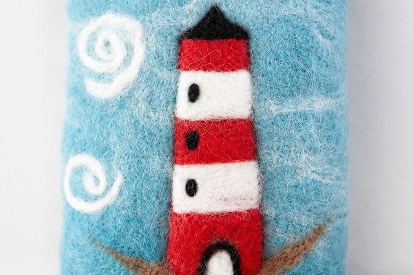 Handyhülle aus Filz blau mit Leuchtturm Detail