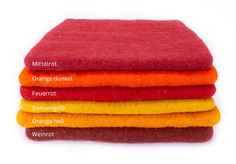 Sitzkissen aus Filz (100% Wolle) Quadratisch, 40x40cm, gelb, rot- und pinktöne - fair gehandelt