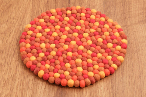Untersetzer rund aus Filzkugeln 22 cm, orange- fair gehandelt