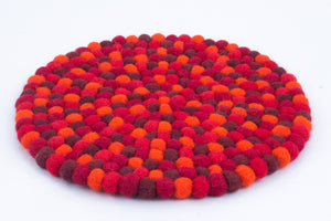 Untersetzer rund aus Filzkugeln 22cm, rot orange- fair gehandelt